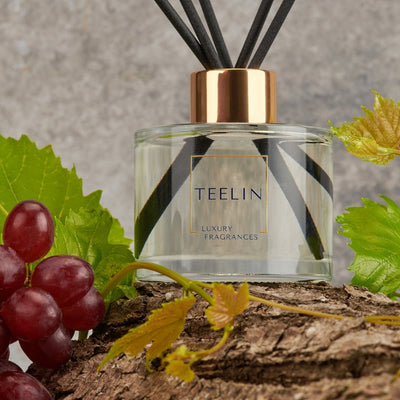 Reed diffuser on a long with vines and grapes