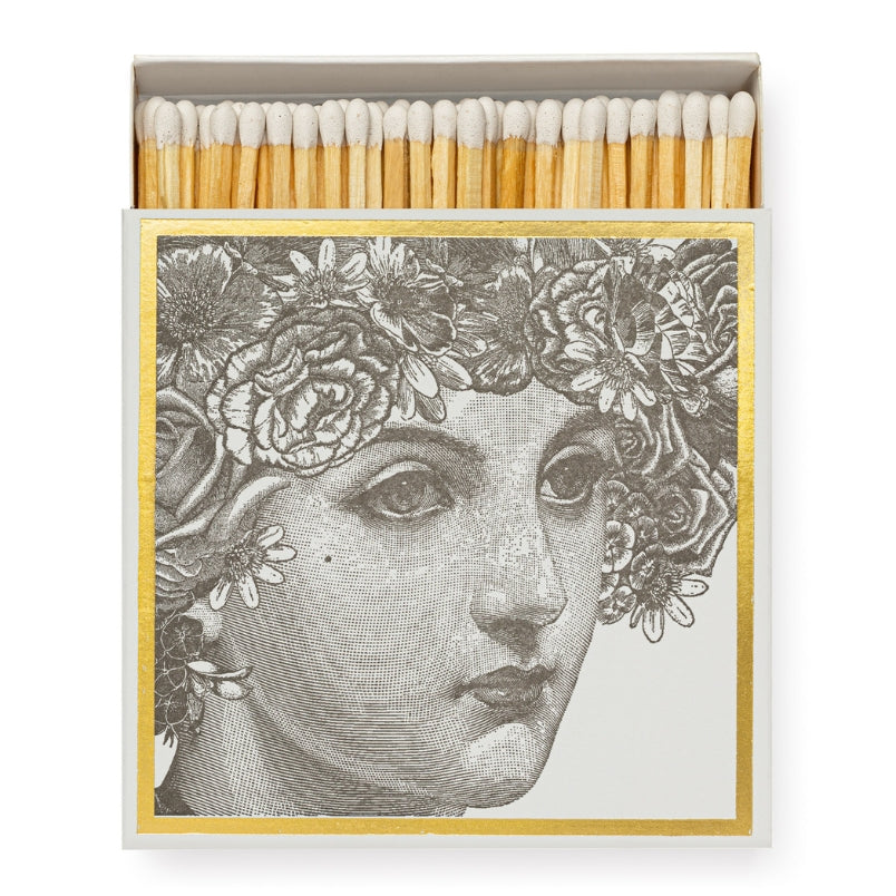 Luxury white matches in a square box featuring The Lady design